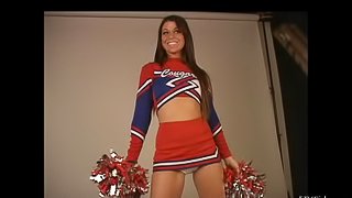 Sexy cheerleader strips off her uniform and gets naked