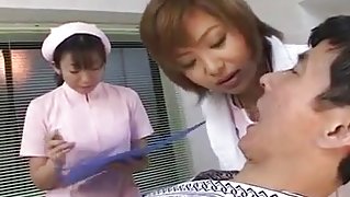 Japanese dentist and nurse spitting on patient