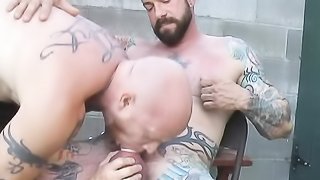 After shaving his head, tattooed buck rides a big hard schlong